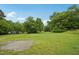 Large yard with mature trees at 620 Mcadams Rd, Hillsborough, NC 27278