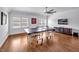 Spacious game room with a ping pong table and a ceiling fan at 6250 Moinear Ln, Chapel Hill, NC 27514