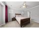Comfortable bedroom with a wooden bed frame and neutral decor at 6313 Kayton St, Raleigh, NC 27616