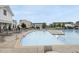 Beautiful community pool area with ample seating, tables and chairs and plenty of shade at 6313 Kayton St, Raleigh, NC 27616
