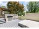This backyard has an outdoor kitchen with grill and cabinets, a hot tub and a fenced yard at 6553 Vintage Ridge Ln, Fuquay Varina, NC 27526