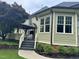 Exterior showcasing the deck, well-maintained siding, and landscaping, highlighting the home's outdoor living space at 6553 Vintage Ridge Ln, Fuquay Varina, NC 27526