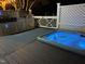 Inviting hot tub and outdoor grill are featured on this backyard deck space, creating an ideal relaxation and entertainment area at 6553 Vintage Ridge Ln, Fuquay Varina, NC 27526