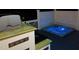 Outdoor space with a hot tub, kitchen and grilling area for entertaining at 6553 Vintage Ridge Ln, Fuquay Varina, NC 27526
