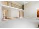 Open-concept living room with lots of natural light, loft and a fireplace at 6553 Vintage Ridge Ln, Fuquay Varina, NC 27526