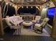 Cozy covered patio with comfortable seating, ideal for relaxing and entertaining outdoors at 6553 Vintage Ridge Ln, Fuquay Varina, NC 27526