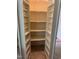 Open pantry with shelving on both doors and on the back wall at 6553 Vintage Ridge Ln, Fuquay Varina, NC 27526