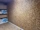 Unfinished storage room featuring shelves and a bare wall at 6553 Vintage Ridge Ln, Fuquay Varina, NC 27526