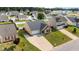 Aerial view of a home featuring a driveway and lawn in a neighborhood with similar homes at 6920 Moss Creek Way, Rocky Mount, NC 27804