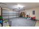 Spacious garage with ample storage and a clean, epoxy-coated floor at 6920 Moss Creek Way, Rocky Mount, NC 27804