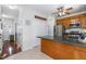 Open kitchen view into entry and hallway at 6924 Coventry Ridge Rd, Raleigh, NC 27616