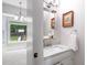 Powder room with elegant fixtures and marble countertop at 6924 Coventry Ridge Rd, Raleigh, NC 27616