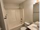 Well-maintained bathroom features a standard tub/shower combination and sink, providing essential amenities at 7331 Bonnie Ridge Ct, Raleigh, NC 27615
