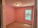 Bright bedroom with window allowing natural light, creating a serene and inviting atmosphere for relaxation at 7331 Bonnie Ridge Ct, Raleigh, NC 27615