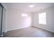 Bright room with window and closet mirrored doors, and light gray floors at 8021 Wesley Farm Dr, Raleigh, NC 27616