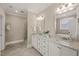 Bathroom featuring a double sink vanity with granite countertops at 900 Green Oaks Pkwy, Holly Springs, NC 27540