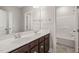 Bathroom with double sink vanity and a bathtub/shower combo at 900 Green Oaks Pkwy, Holly Springs, NC 27540