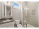 Bathroom with granite countertops, glass shower, and neutral tile work at 900 Green Oaks Pkwy, Holly Springs, NC 27540