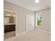 This bedroom has a bathroom and walk-in closet attached at 900 Green Oaks Pkwy, Holly Springs, NC 27540
