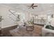 Spacious living room with seamless transition to the kitchen and staircase at 900 Green Oaks Pkwy, Holly Springs, NC 27540