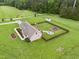 Expansive property with a charming home, fenced backyard, playground, and mature trees at 9300 Lake Wheeler Rd, Fuquay Varina, NC 27526