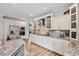 Modern kitchen featuring stainless steel appliances, granite countertops, and ample cabinet space for storage at 9300 Lake Wheeler Rd, Fuquay Varina, NC 27526