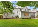 The backyard features a lush lawn and offers plenty of space for activities at 9425 Brimstone Ln, Raleigh, NC 27613