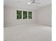 Bright bedroom with plush carpet and great natural light at 9425 Brimstone Ln, Raleigh, NC 27613