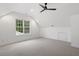 Bonus room features vaulted ceiling with ceiling fan and great natural light at 9425 Brimstone Ln, Raleigh, NC 27613