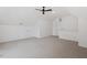 Large bonus room with neutral carpet, great ceiling fan, and plenty of natural light at 9425 Brimstone Ln, Raleigh, NC 27613