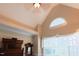 This bedroom boasts a high ceiling, a large window, and a decorative mirror at 100 Sheraton Ln, Garner, NC 27529