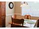Warm breakfast nook with window and wooden table at 100 Sheraton Ln, Garner, NC 27529