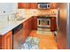 Well-equipped kitchen featuring granite countertops, stainless steel appliances, and light wood cabinetry at 100 Sheraton Ln, Garner, NC 27529