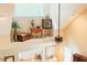 Elegant living room showcasing a decorative ledge, stylish decor, and a high ceiling at 100 Sheraton Ln, Garner, NC 27529