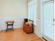 Cozy sunroom featuring tiled flooring, large windows with plenty of natural light, and stylish decor at 100 Sheraton Ln, Garner, NC 27529
