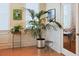 Sunny sunroom featuring tiled floors, large windows with blinds, and views to the exterior at 100 Sheraton Ln, Garner, NC 27529