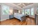 Spacious main bedroom with hardwood floors, large windows and decorative ceiling at 104 Crosby Ln, Sanford, NC 27330