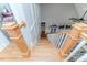 Beautiful hardwood staircase with white risers, leading to a cozy living space at 104 Crosby Ln, Sanford, NC 27330