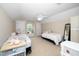 Bright bedroom featuring neutral walls and filled with natural light, perfect for children at 106 Roundtop Rd, Cary, NC 27519