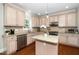 Kitchen featuring granite countertops, wooden cabinetry, and stainless steel appliances at 106 Roundtop Rd, Cary, NC 27519