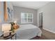 Comfortable bedroom with hardwood floors, ample light, and stylish decor at 107 Covington Dr, Chapel Hill, NC 27514