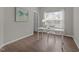 Bright home office featuring hardwood floors, lots of natural light, and comfortable work space at 107 Covington Dr, Chapel Hill, NC 27514