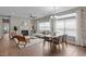 Cozy living room with dining area and hardwood flooring, great for entertaining or relaxing at 107 Covington Dr, Chapel Hill, NC 27514