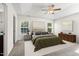 Tranquil bedroom with neutral tones, soft carpet, and large windows at 109 Citrine Ct, Durham, NC 27703