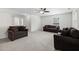 Cozy living room filled with comfortable seating and soft carpet at 109 Citrine Ct, Durham, NC 27703