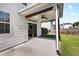 Covered patio provides an outdoor area to relax and entertain at 109 Citrine Ct, Durham, NC 27703