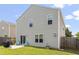 Back of home featuring a patio with grill and Adirondack chairs, and a fenced yard at 110 Bray Dr, Mebane, NC 27302