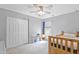 bedroom with a twin bed, white closet, and natural light at 110 Bray Dr, Mebane, NC 27302