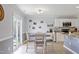 Bright breakfast area with a sliding glass door and views of the backyard at 110 Bray Dr, Mebane, NC 27302