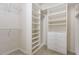 Organized walk-in closet with custom shelving and drawers, maximizing storage space at 11005 Louson Pl, Raleigh, NC 27614